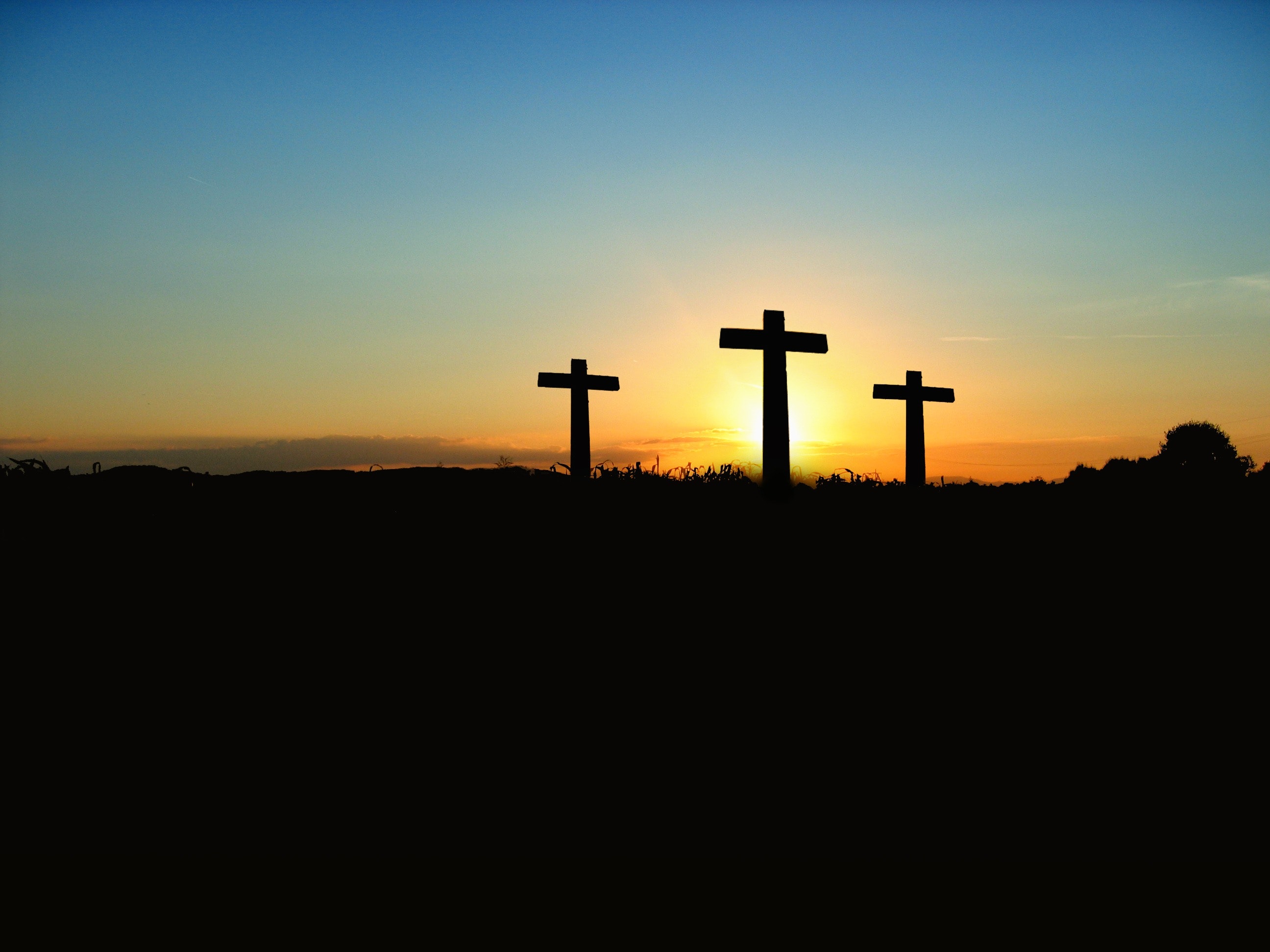 Three empty crosses